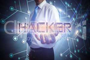 Businessman presenting the word hacker