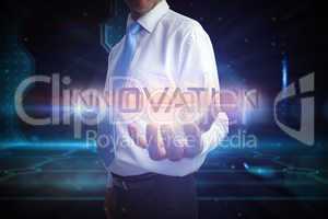 Businessman presenting the word innovation
