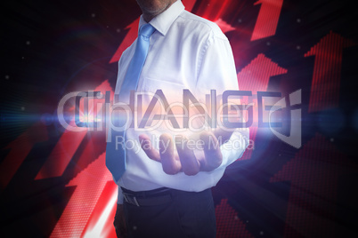 Businessman presenting the word change