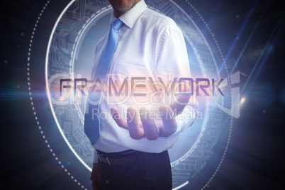 Businessman presenting the word framework