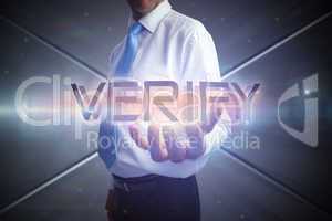Businessman presenting the word verify