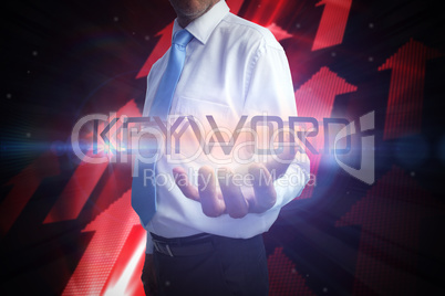 Businessman presenting the word keyword