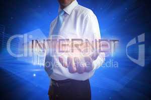 Businessman presenting the word internet