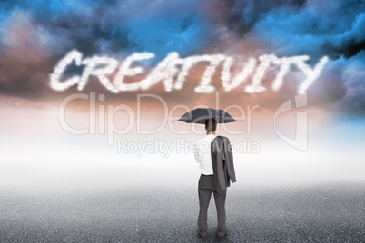 Creativity against cloudy landscape background