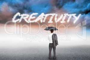 Creativity against cloudy landscape background