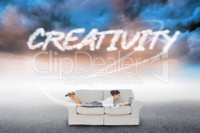 Creativity  against cloudy landscape background
