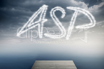 Asp against cloudy sky over ocean