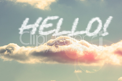 Hello! against bright blue sky with cloud