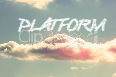 Platform against bright blue sky with cloud