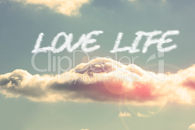 Love life against bright blue sky with cloud