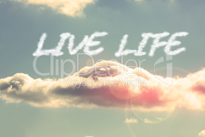 Live life against bright blue sky with cloud