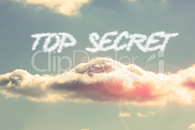 Top secret against bright blue sky with cloud