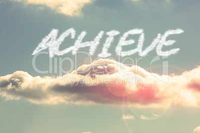 Achieve against bright blue sky with cloud