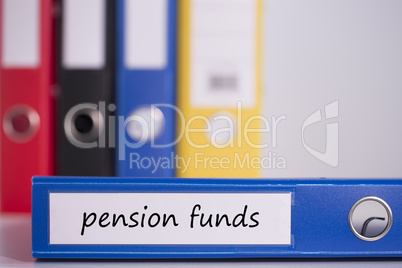 Pension funds on blue business binder