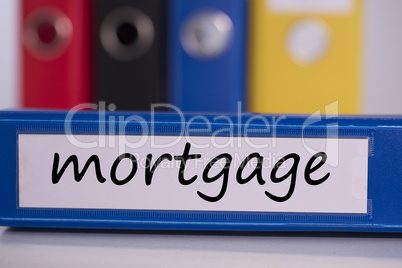Mortgage on blue business binder