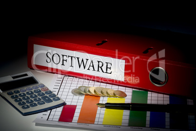 Software on red business binder