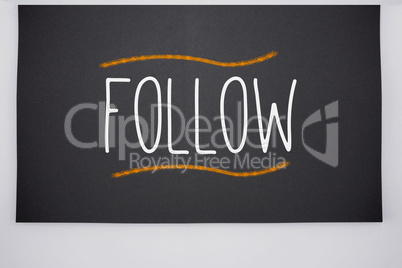 Follow written on big blackboard