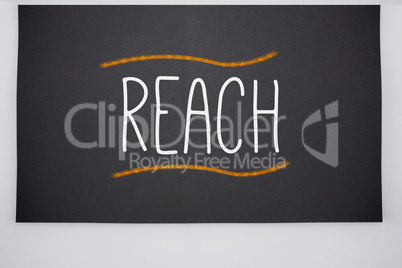 Reach written on big blackboard