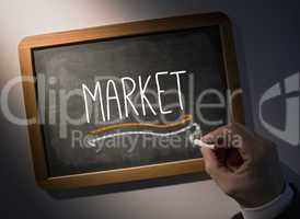 Hand writing Market on chalkboard