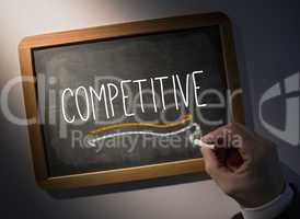 Hand writing Competitive on chalkboard