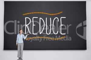 Businesswoman presenting the word reduce