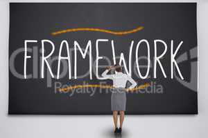 Businesswoman considering the word framework