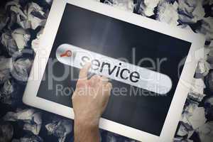 Hand touching service on search bar on tablet screen