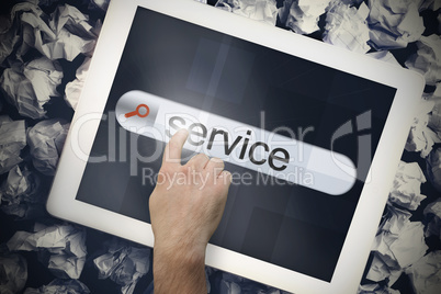 Hand touching service on search bar on tablet screen