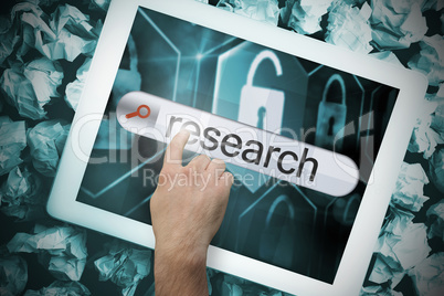 Hand touching research on search bar on tablet screen