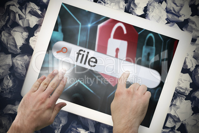 Hand touching file on search bar on tablet screen