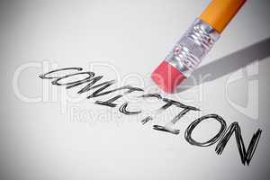 Pencil erasing the word Conviction