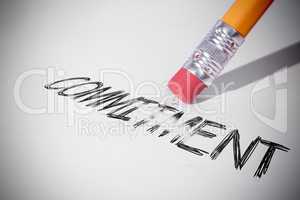 Pencil erasing the word Commitment