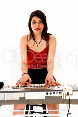 woman playing on keyboard.