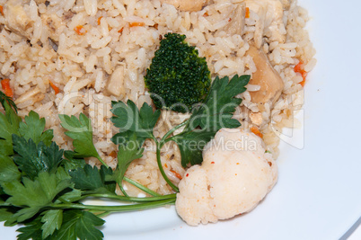 Rice with meat and fresh herbs.
