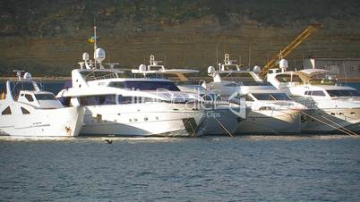 White yacht at the pier.