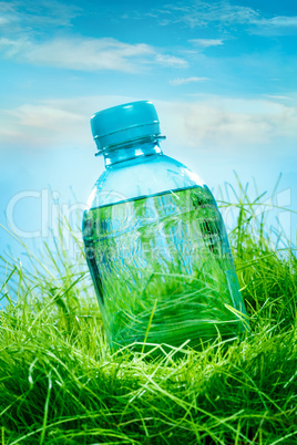 water bottle on the grass