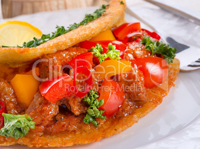 hungarian goulash with potato pancake