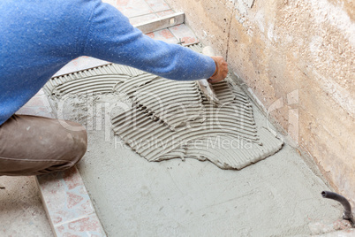 Tiler works with flooring