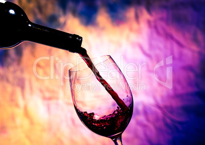 red wine poured into wineglass