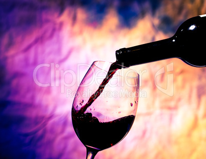 red wine poured into wineglass