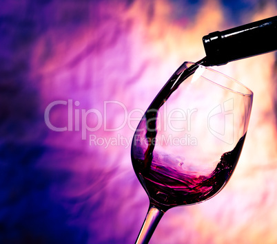 red wine poured into wineglass