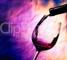 red wine poured into wineglass