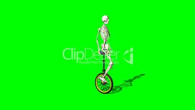 skeleton moves with unicycle - green screen