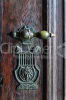 vintage doorknob on antique door