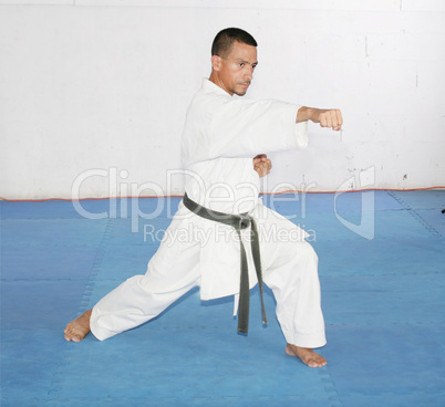 black belt man in kimono during training karate kata exercises i