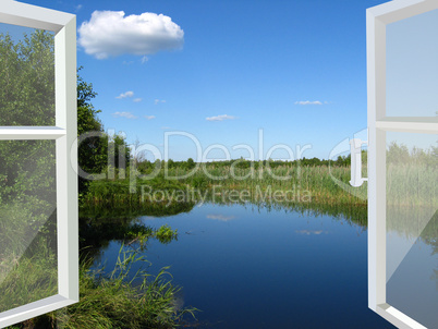 opened window to the lake and meadow