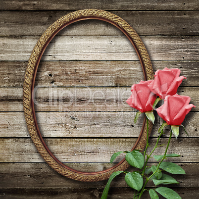 old vintage frame for photos and a bouquet of yellow roses