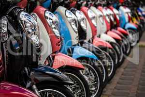 line of new motorbikes in a shop
