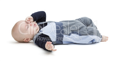 tired baby on floor isolated on white