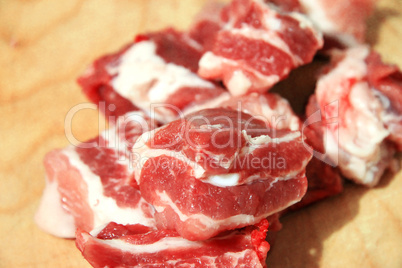 Fresh pork cutting on the wooden desk